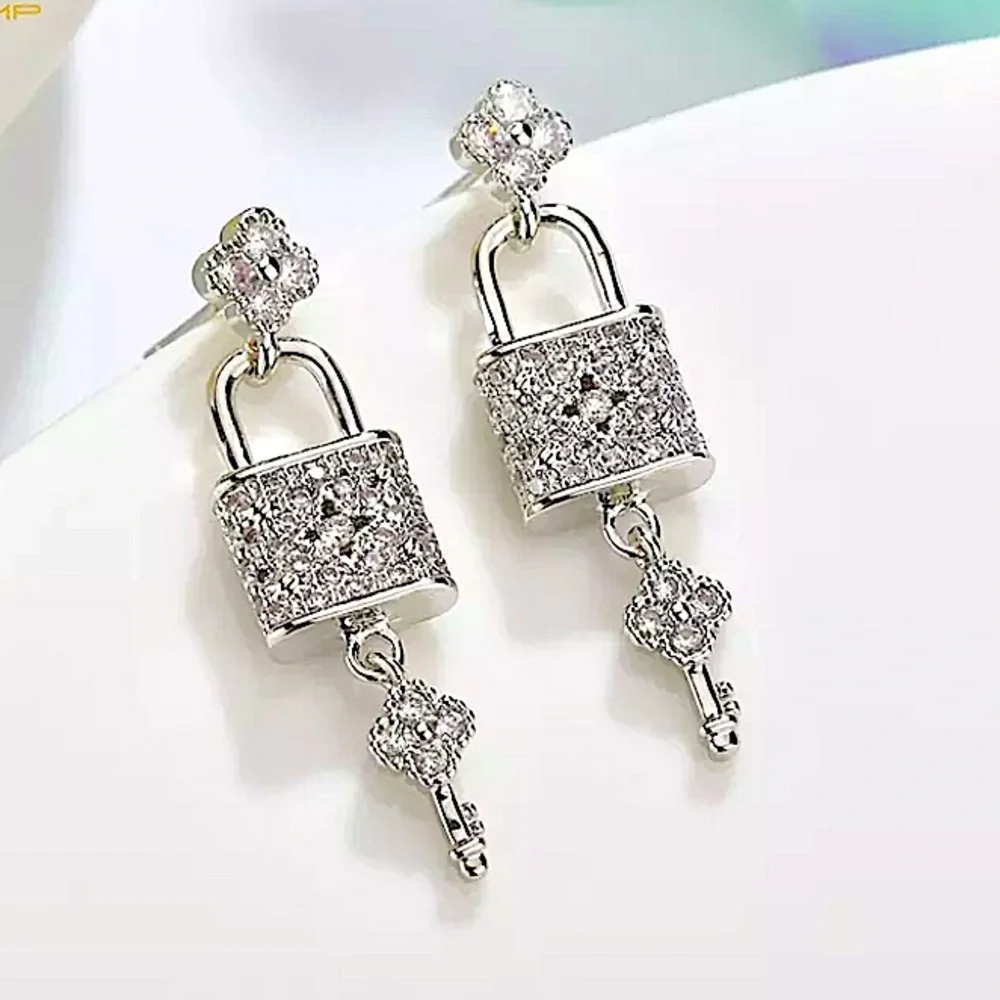 STERLING SILVER BLOSSOM LOCK KEY EARRINGS - Picture 2 of 11